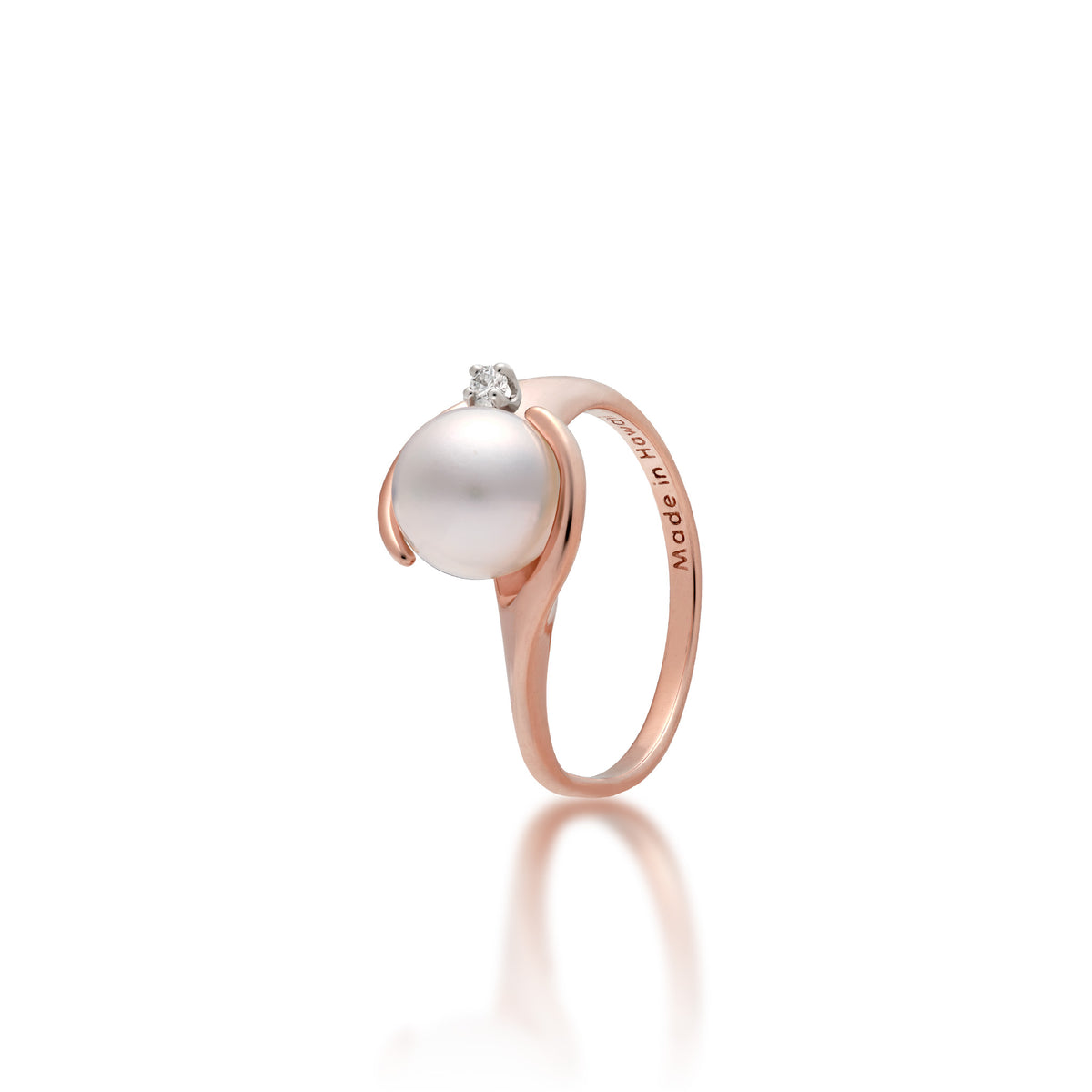 A 14k rose gold ring with soft curves at the crown that frame a diamond-accented Akoya white pearl, shown on a white background
