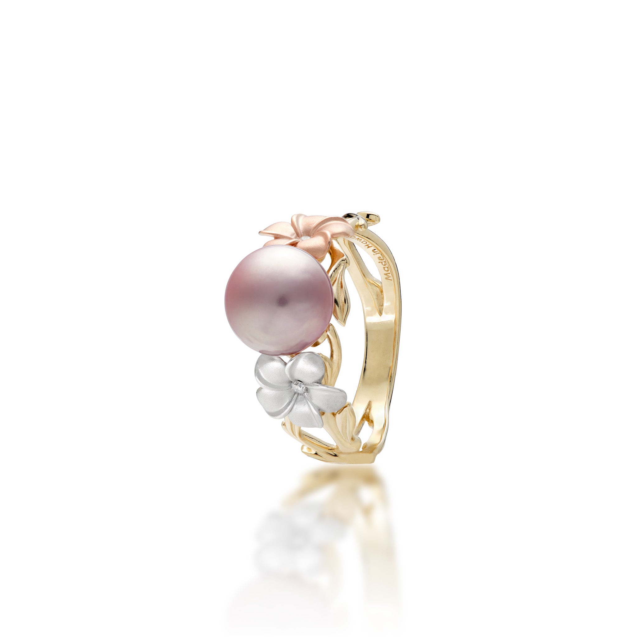 Angle view of the Pearls in Bloom Plumeria 8mm Lavender Freshwater Pearl Ring in Tri Color Gold with Diamonds on a white background