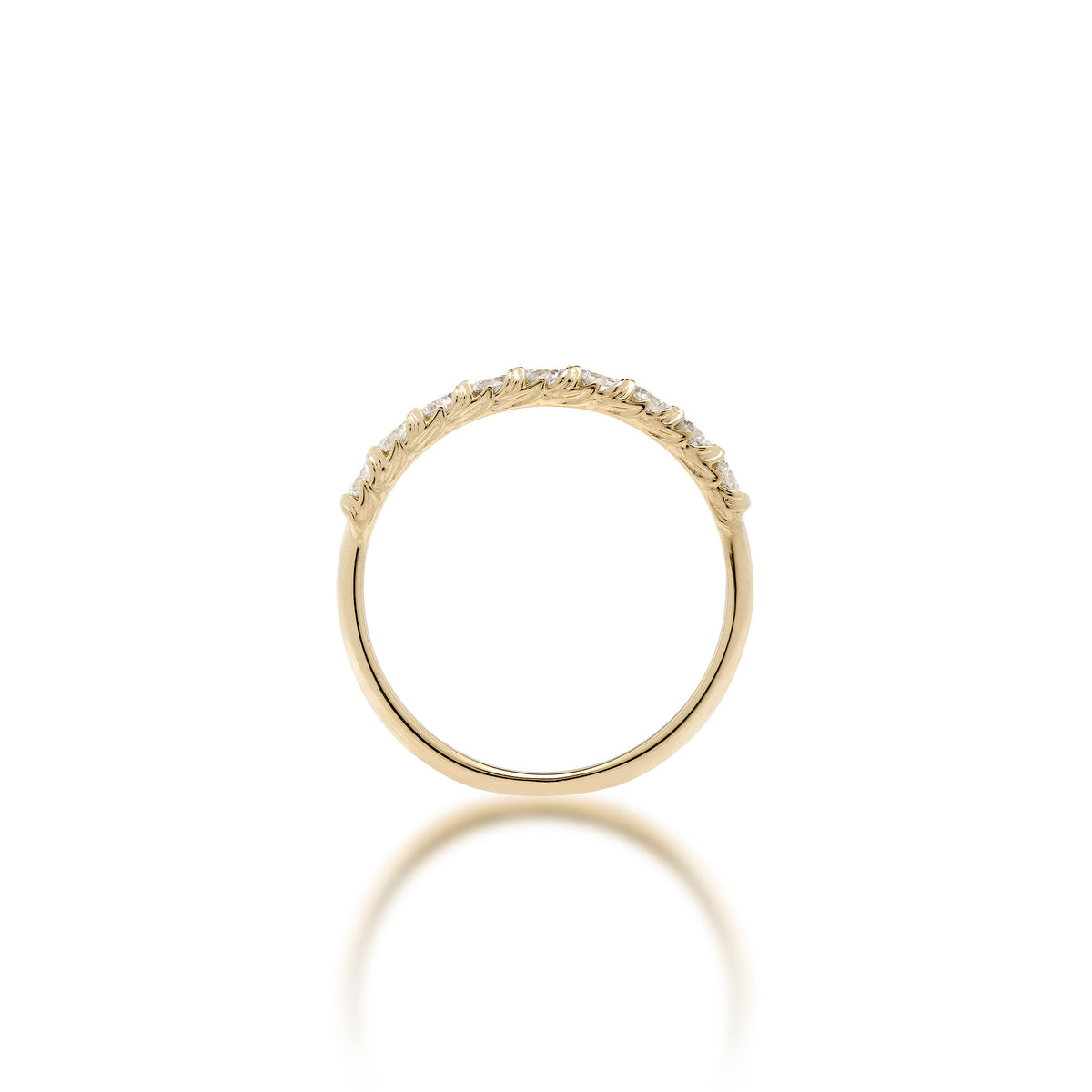 Side view of a 3mm 14k yellow gold anniversary ring showcasing the maile leaf detailed prongs holding a row of Lab Grown Diamonds shown on a white background