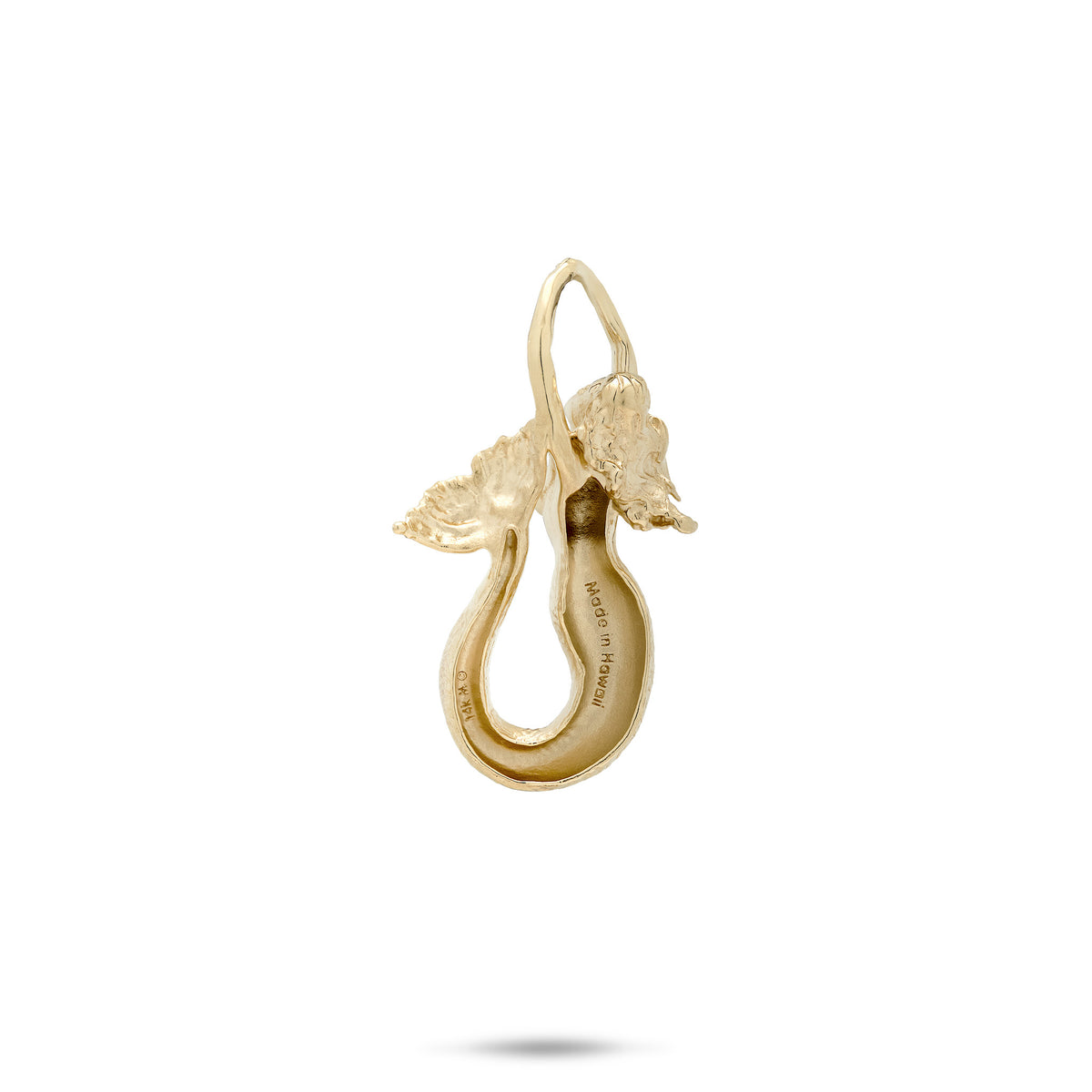 Backside of a 14k yellow gold high-polish mermaid pendant with her arms reaching out to form a bail and a tail that curves up to her neck. Stamped '14k' and 'Made in Hawaii'. Shown on a white background.