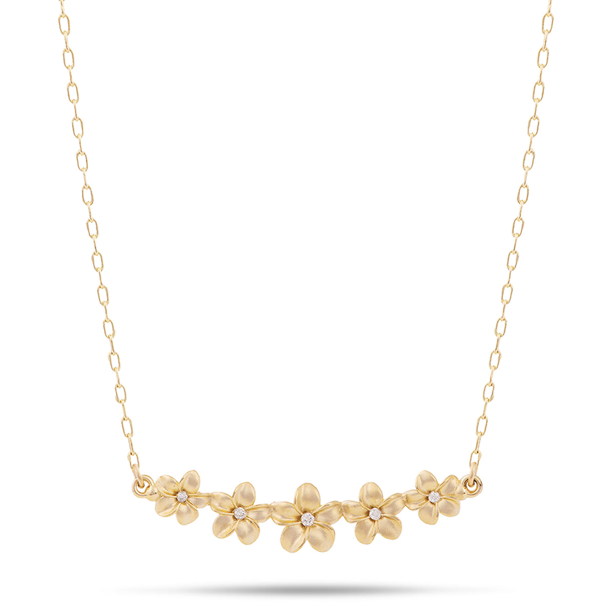 A 14k yellow gold plumeria necklace with a five plumeria flowers with diamond accents at the center of each flower, on a cable chain, shown on a white background