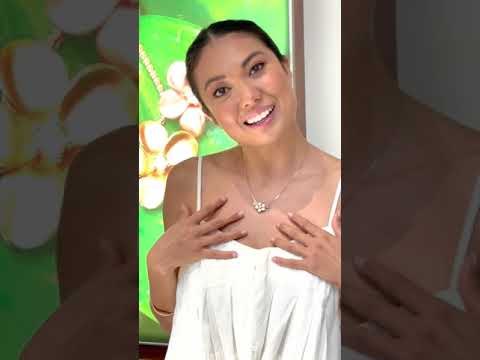 Video of a woman showing how to Style the Puffy Plumeria - Maui divers Jewelry