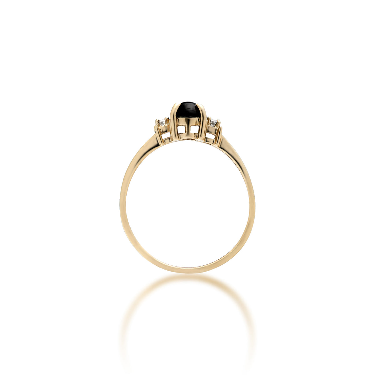 Profile view of a 14k yellow gold ring with a small oval Hawaiian black coral gem with a diamond accent on each side and 'Made in Hawaii' stamp on the inside of the ring, shown on a white background