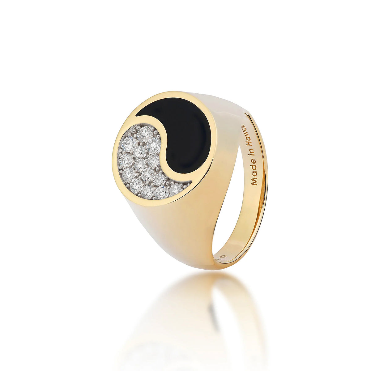 Tapered 17.5mm Yin Yang signet Ring  in high-polish 14k yellow gold with Hawaiian black coral inlay and natural diamonds that create the yin yang design and a ʻMade in Hawaiiʻ inscription inside the band on a white background
