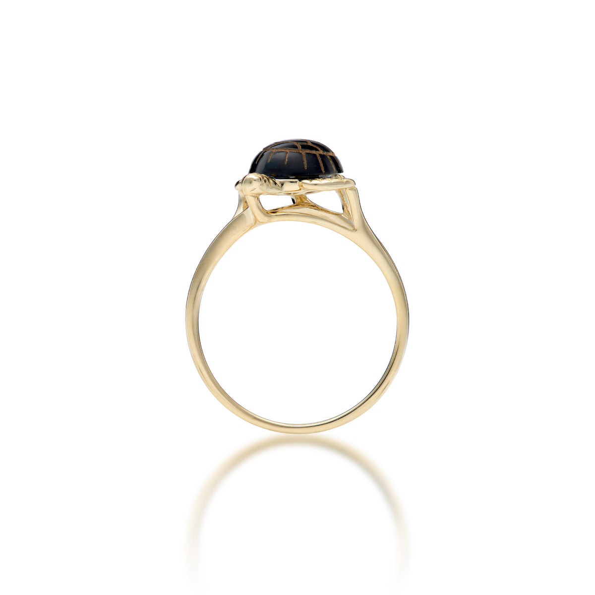 Side view of a 14k yellow gold Hawaiian green sea turtle ring with etched Hawaiian black coral as the shell and life-like high-polish gold detailing for the head and legs, shown on a white background