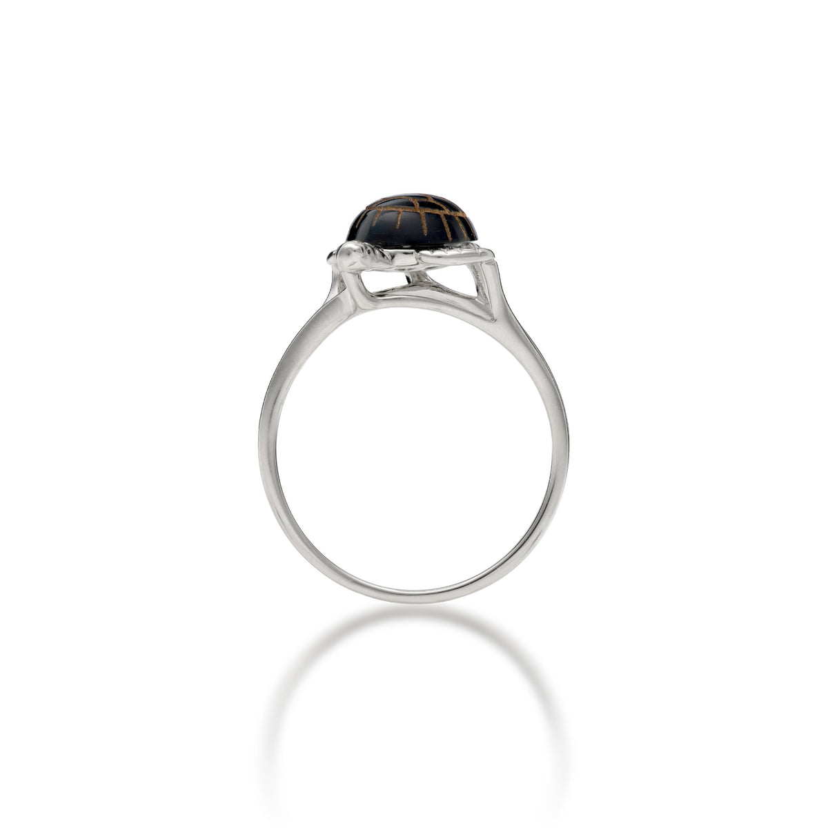 Side view of a 14k yellow gold Hawaiian green sea turtle ring with etched Hawaiian black coral as the shell and life-like high-polish gold detailing for the head and legs, shown on a white background