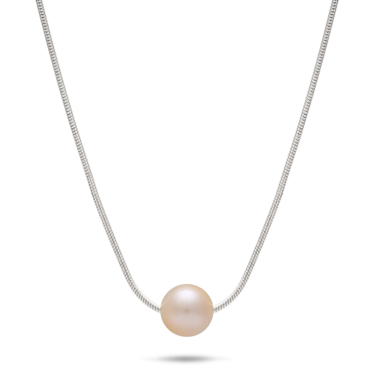 A sterling silver snake chain floating pearl necklace with a single pink/peach freshwater pearl, shown on a white background