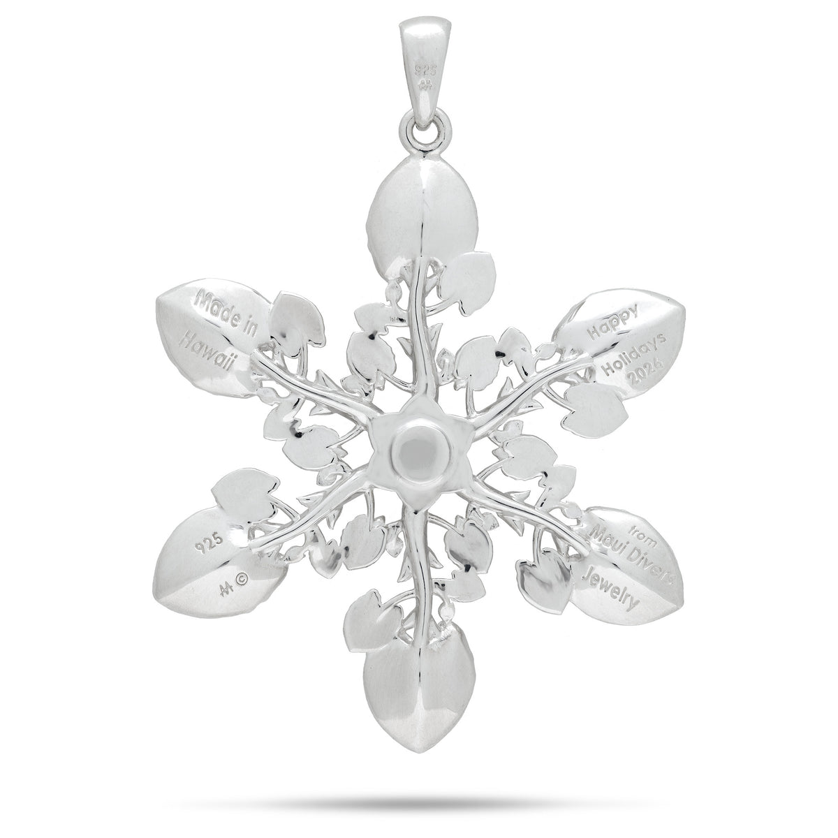 Backside of a  sterling silver kalo leaf ornament/pendant in a snowflake style formation showcasing the engravings 'Made in Hawaii', 'Happy Holidays 2026 from Maui Divers Jewelry', and '925' stamp, shown on a white background