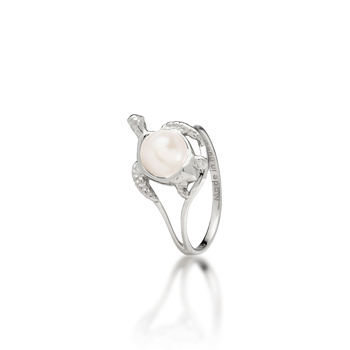 A 14k white gold sea turtle ring with a white freshwater pearl as its shell, shown on a white background