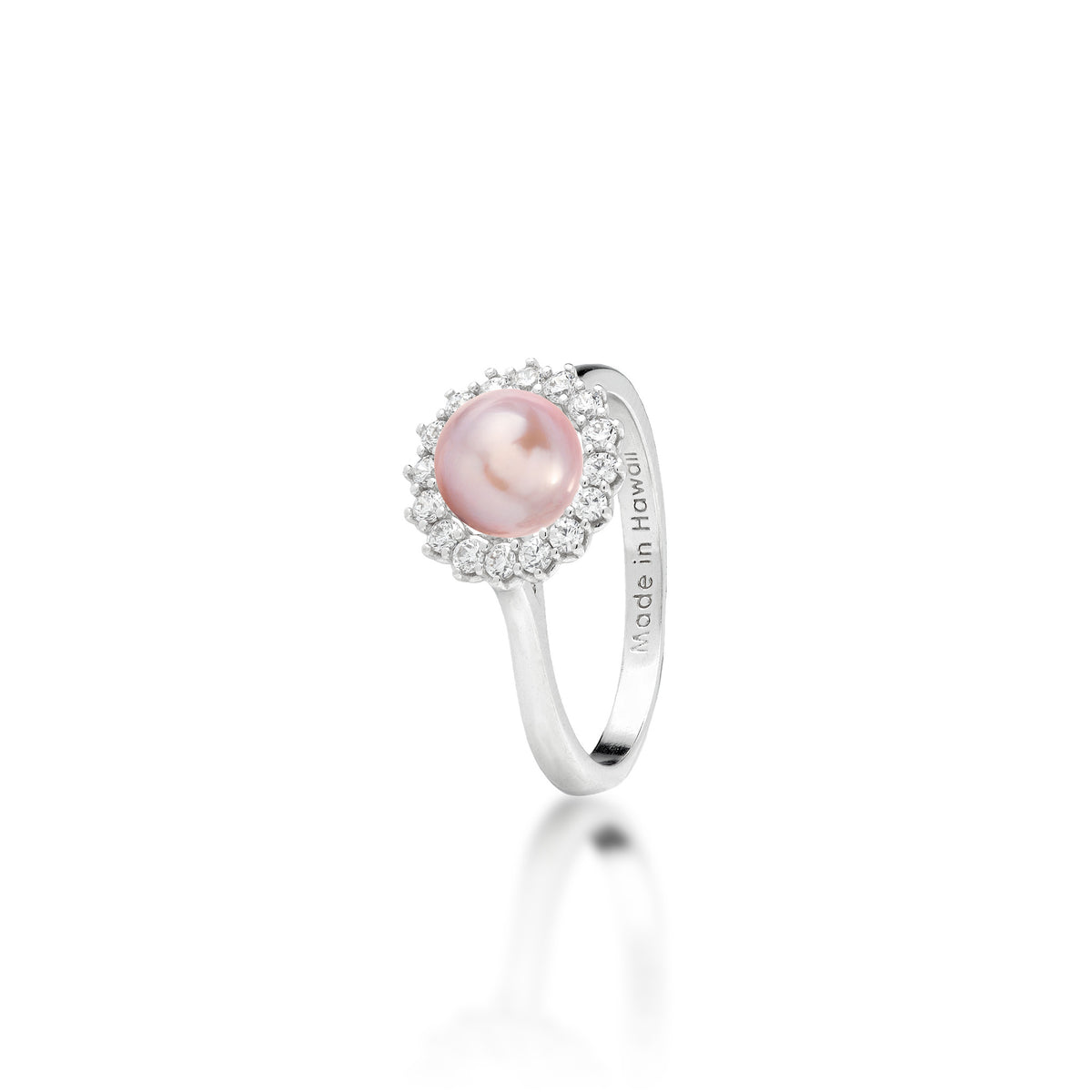 A sterling silver ring with a cubic zirconia halo and lavender freshwater pearl at the center, shown on a white background