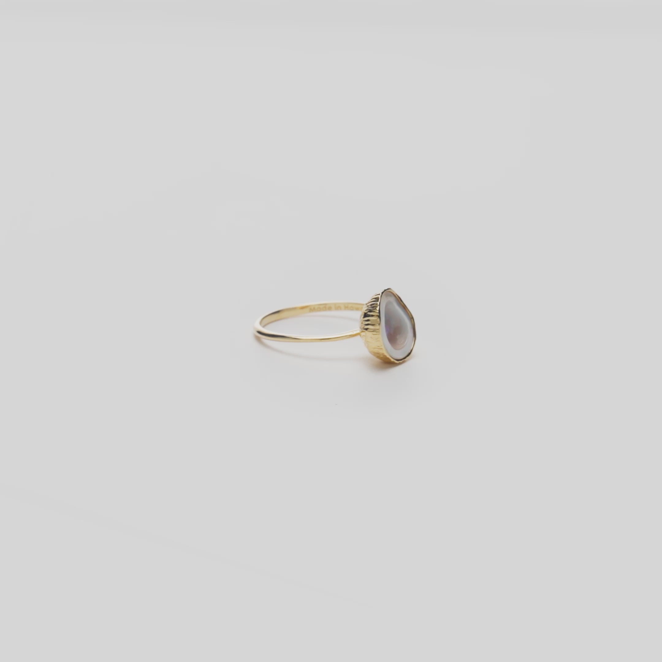 Video showcasing the 10mm Coconut Mother of Pearl Ring in 14k Yellow Gold