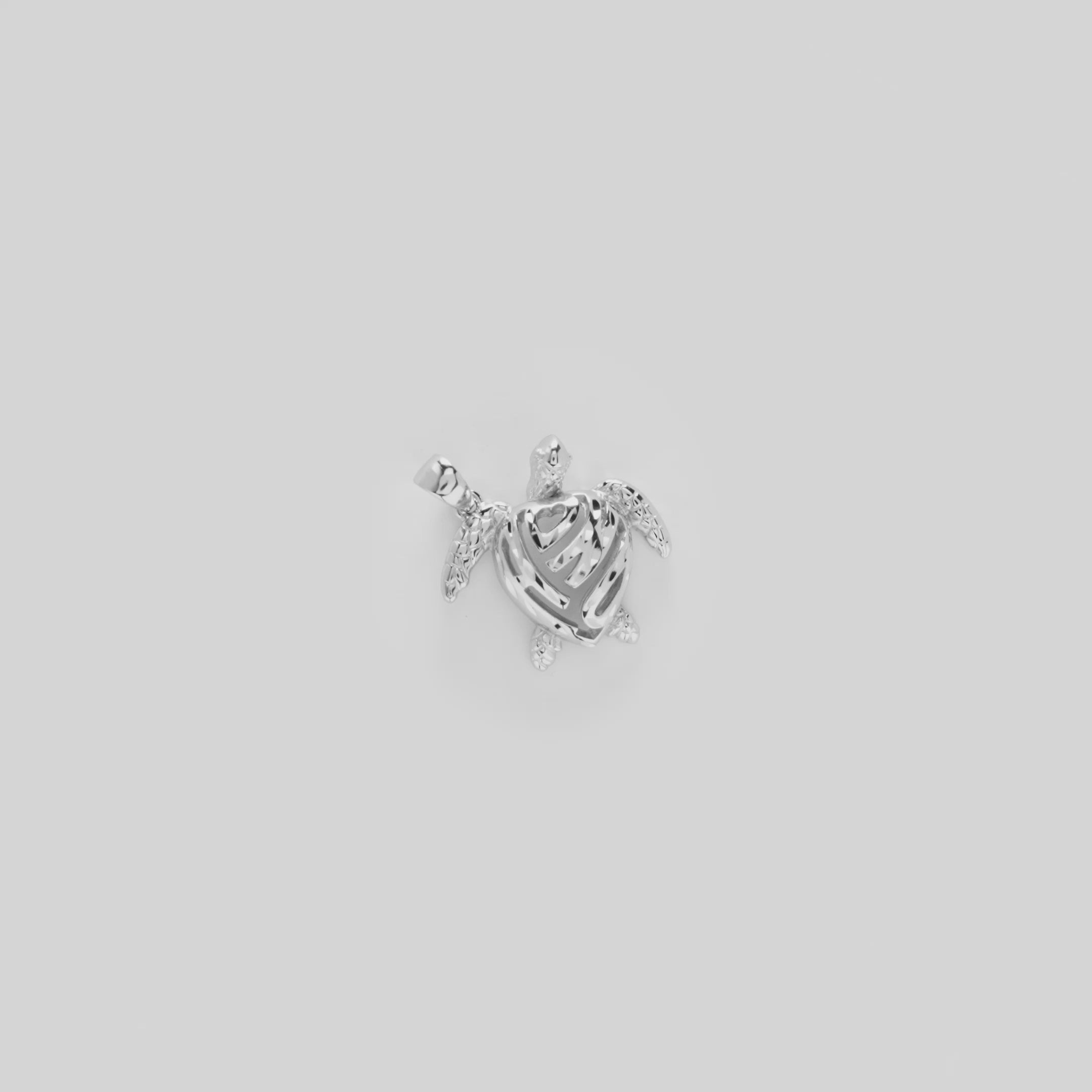 Video showcasing the 19mm Honu Pendant in Sterling Silver