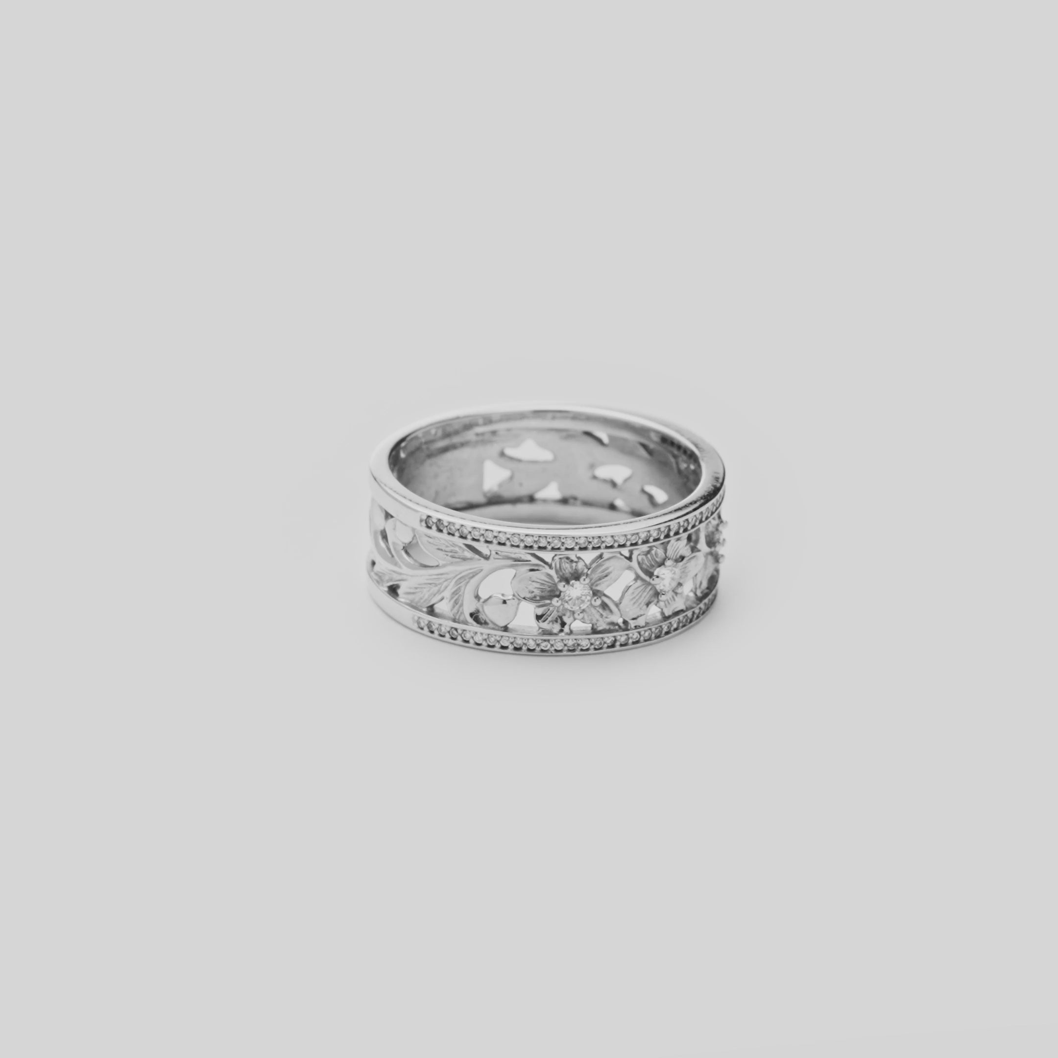 Video showcasing the 8mm Hawaiian Heirloom Plumeria Ring in 14k White Gold with Diamonds