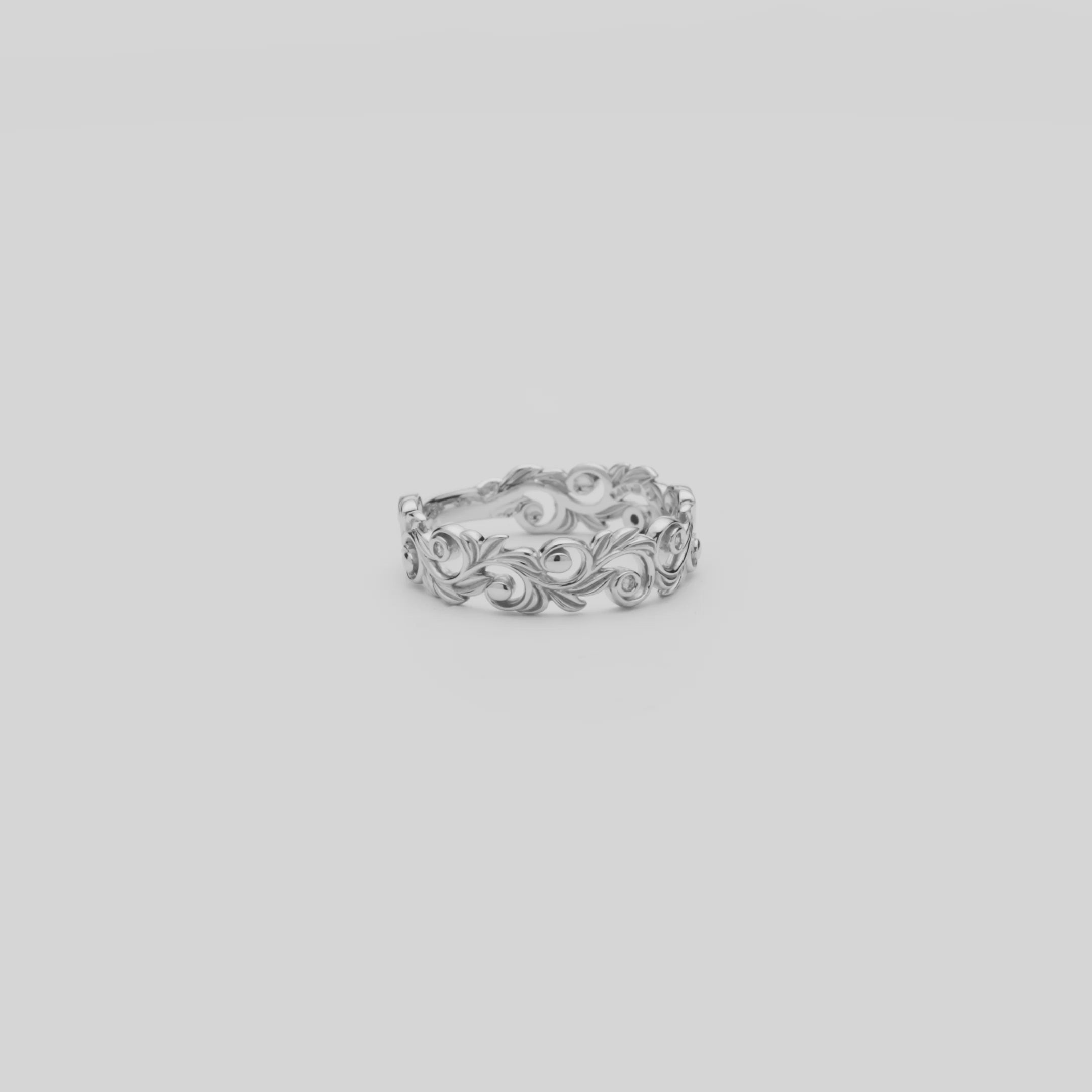Video of the 6mm Living Heirloom Ring in White Gold with Diamonds turning on a white background