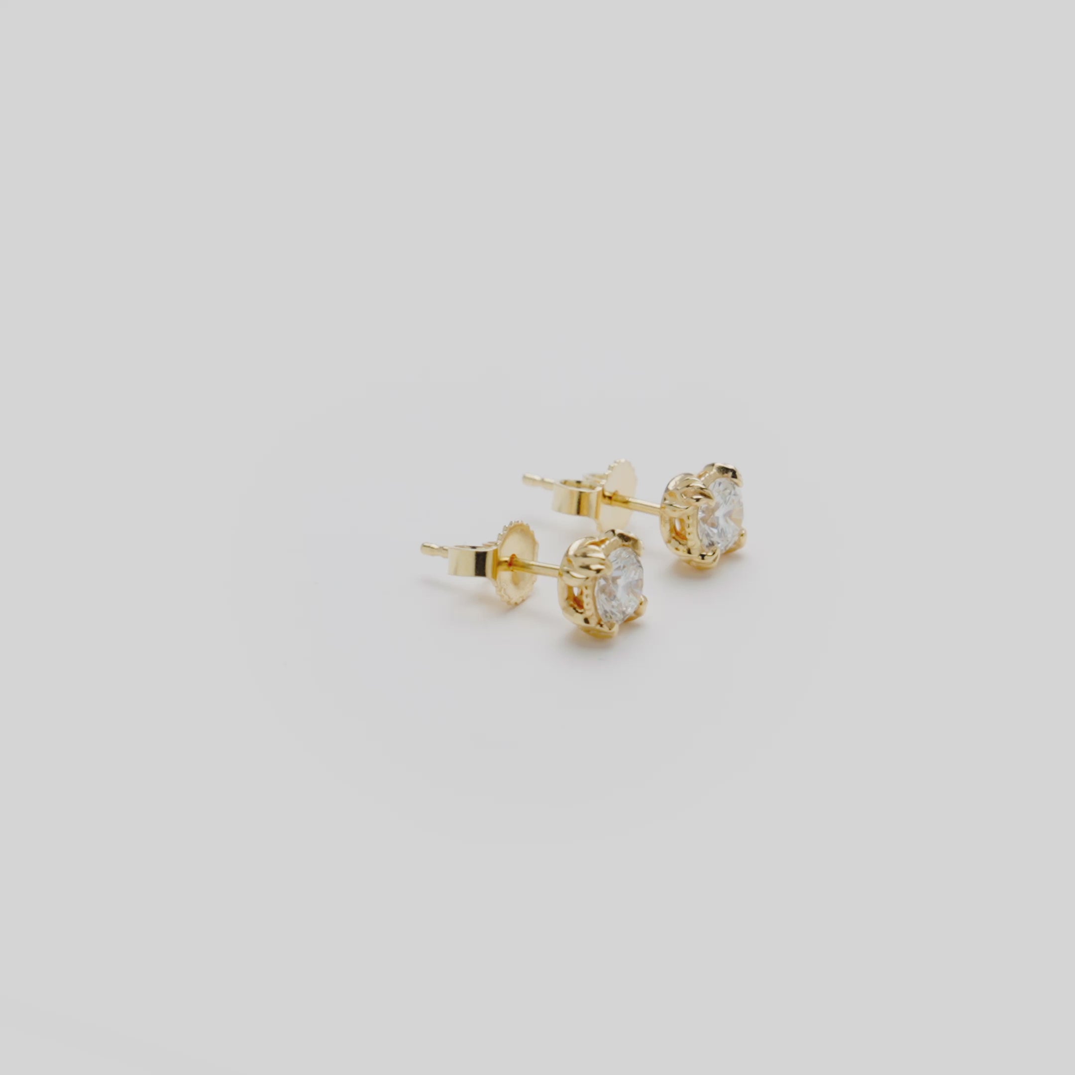 Video showcasing the 5.5mm Hidden Hawaiʻi Maile Lab Grown Diamond Earrings in 14k Yellow Gold