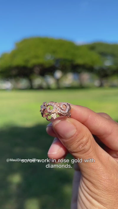 Video of a woman's hand wearing a Hawaiian Heirloom Plumeria Ring in Rose Gold with Diamonds - 8mm - Maui Divers Jewelry